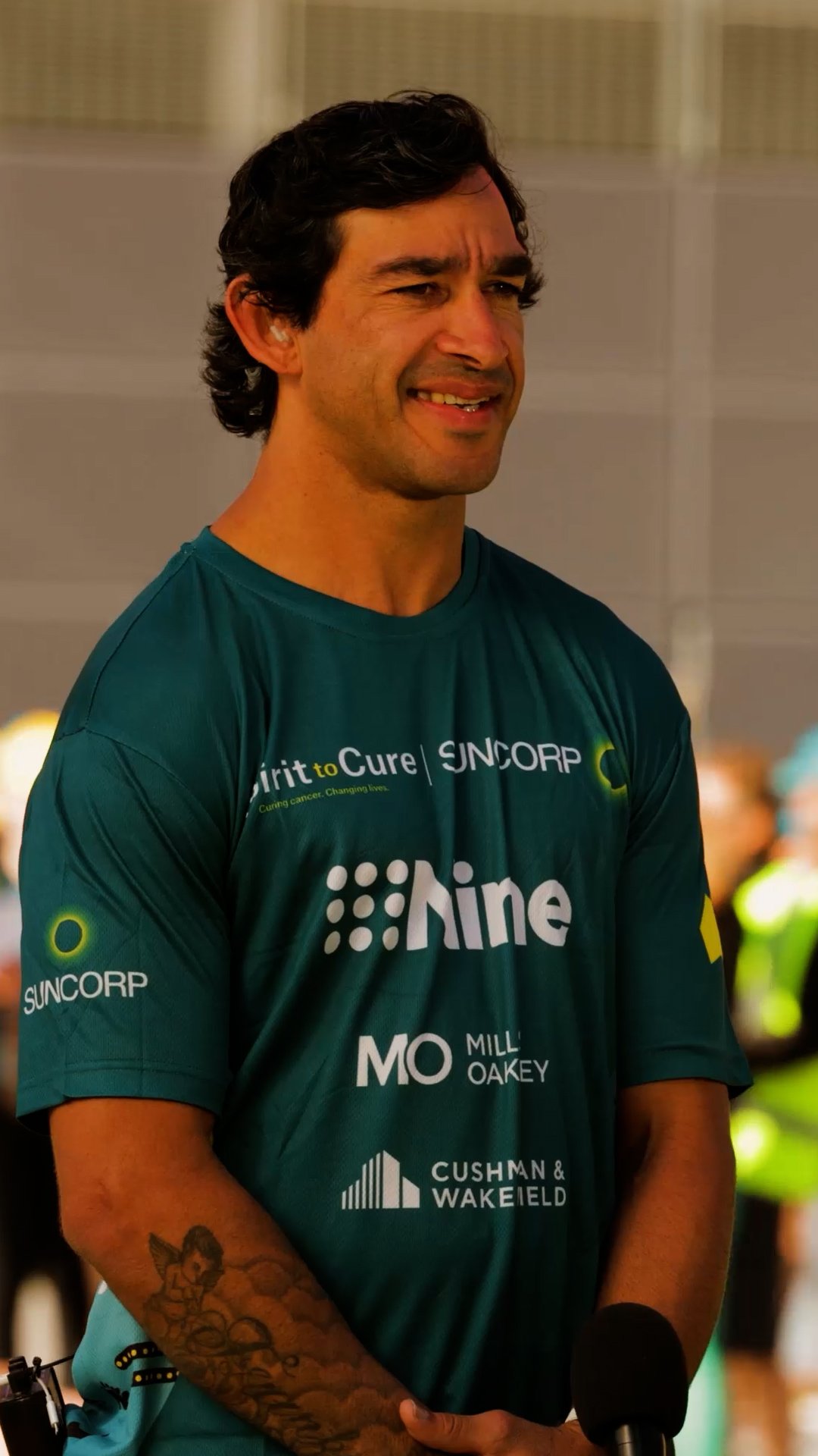 Smiling Tour de Cure ambassador in team colours